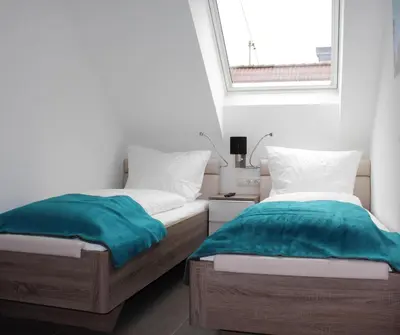 Ein Bett oder Betten in einem Zimmer der Unterkunft Ferienwohnung Hohe Acht