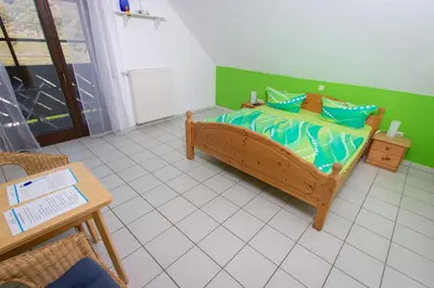 Ein Bett oder Betten in einem Zimmer der Unterkunft Weingut Christian Bucher