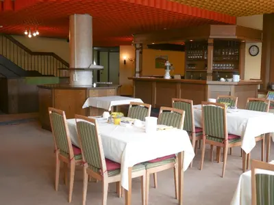 Ein Restaurant oder anderes Speiselokal in der Unterkunft Hotel Oronto