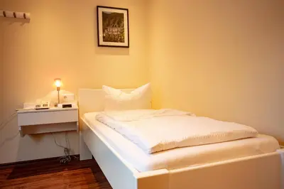 Ein Bett oder Betten in einem Zimmer der Unterkunft Hotel Mosella