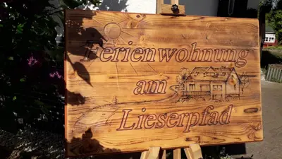 Ein Zertifikat, Auszeichnung, Logo oder anderes Dokument, das in der Unterkunft Ferienwohnung am Lieserpfad ausgestellt ist