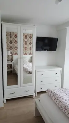 Ein Bett oder Betten in einem Zimmer der Unterkunft Ferienhaus BARFLY