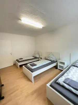 Ein Bett oder Betten in einem Zimmer der Unterkunft Holiday Apartment Adenau