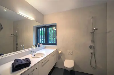 Ein Badezimmer in der Unterkunft Architektur Ferienhaus Eifel SUITE17
