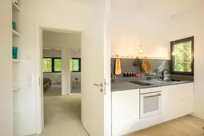 Küche/Küchenzeile in der Unterkunft Architektur Ferienhaus Eifel SUITE17