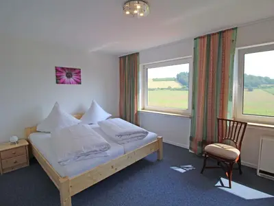 Ein Bett oder Betten in einem Zimmer der Unterkunft Apartment Eifelnatur - Haus 3-2 by Interhome