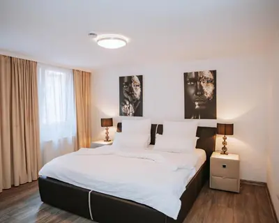 Ein Bett oder Betten in einem Zimmer der Unterkunft Ferienhaus Moselpromenade