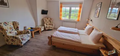 Ein Bett oder Betten in einem Zimmer der Unterkunft Weinhaus Stettler