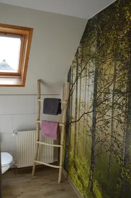 Ein Bett oder Betten in einem Zimmer der Unterkunft Ferienhaus Eifel-Charme