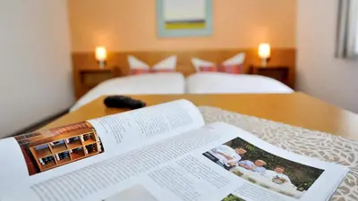Ein Bett oder Betten in einem Zimmer der Unterkunft Hotel Restaurant Onkel-Otto