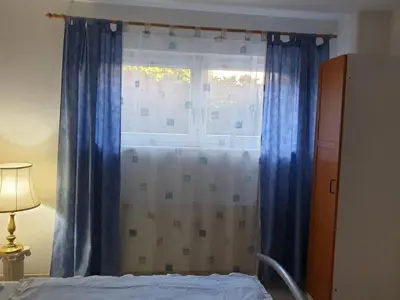 Ein Bett oder Betten in einem Zimmer der Unterkunft Schöne große Ferienwohnung im Mittelrheintal nahe Loreley