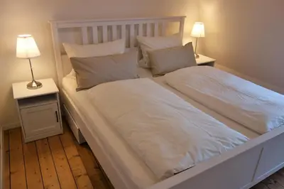 Ein Bett oder Betten in einem Zimmer der Unterkunft Ferienhaus am Moselsteig