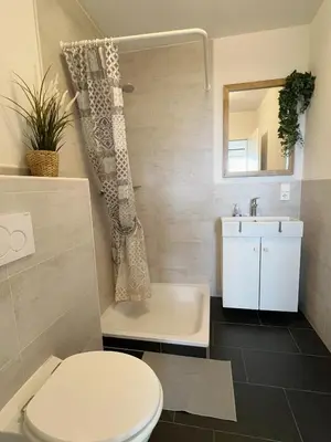 Ein Badezimmer in der Unterkunft Ferienwohnung im Hunsrück Neubau