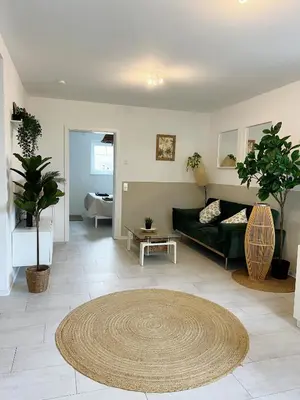 Ein Sitzbereich in der Unterkunft Ferienwohnung im Hunsrück Neubau