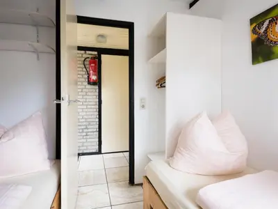 Ein Bett oder Betten in einem Zimmer der Unterkunft Holiday Home Haus 11 by Interhome