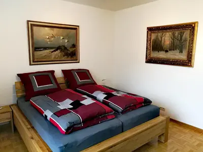 Ein Bett oder Betten in einem Zimmer der Unterkunft Ferienwohnung Confluentia in der Koblenzer Altstadt