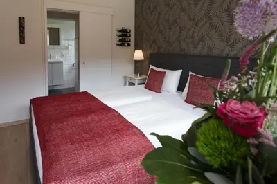 Ein Bett oder Betten in einem Zimmer der Unterkunft Hotel Restaurant Sonnenlay