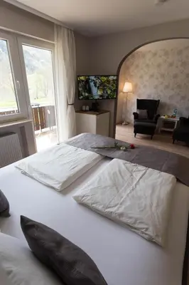 Ein Bett oder Betten in einem Zimmer der Unterkunft Hotel Restaurant Sonnenlay