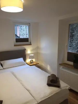 Ein Bett oder Betten in einem Zimmer der Unterkunft Schlössje
