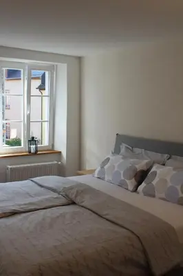 Ein Bett oder Betten in einem Zimmer der Unterkunft Schlössje