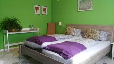 Ein Bett oder Betten in einem Zimmer der Unterkunft Exklusive Ferienwohnung Lurelei 150 qm mit Traumblick 4 bis 9 P