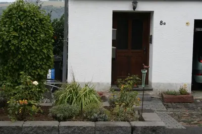 Ein Garten an der Unterkunft Exklusive Ferienwohnung Lurelei 150 qm mit Traumblick 4 bis 9 P