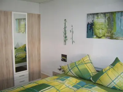 Ein Bett oder Betten in einem Zimmer der Unterkunft Ferienhaus Mosel/Trittenheim
