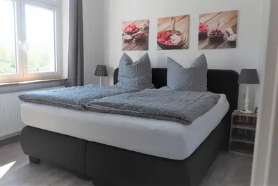 Ein Bett oder Betten in einem Zimmer der Unterkunft Ferienhaus Maja