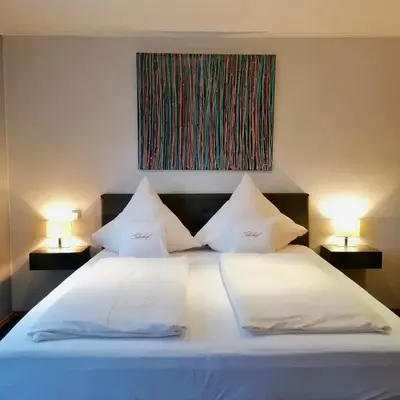 Ein Bett oder Betten in einem Zimmer der Unterkunft Weingut Tiliahof