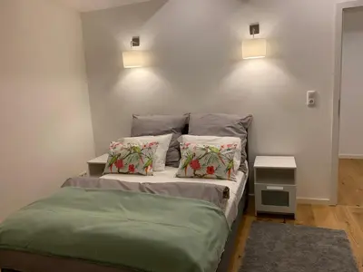 Ein Bett oder Betten in einem Zimmer der Unterkunft Home Feeling trierweiler