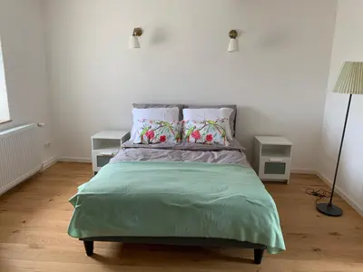 Ein Bett oder Betten in einem Zimmer der Unterkunft Home Feeling trierweiler