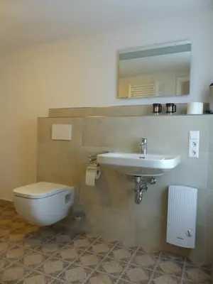 Ein Badezimmer in der Unterkunft Schusters Haus - Ferienhaus