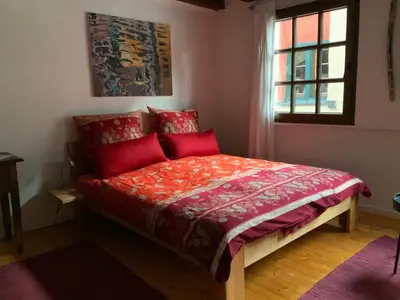 Ein Bett oder Betten in einem Zimmer der Unterkunft Paulusstrasse 1