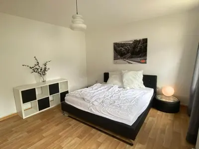 Ein Bett oder Betten in einem Zimmer der Unterkunft Nürburgring Ferienhaus m. Parkplatz - Klima - Garten und viel Platz