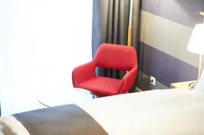 Ein Bett oder Betten in einem Zimmer der Unterkunft Hotel Garni am Schloss