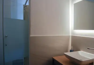 Ein Badezimmer in der Unterkunft Alte Schule Gästehaus - The principal's rooms Appartment
