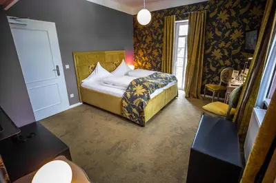 Ein Bett oder Betten in einem Zimmer der Unterkunft Domäne am See