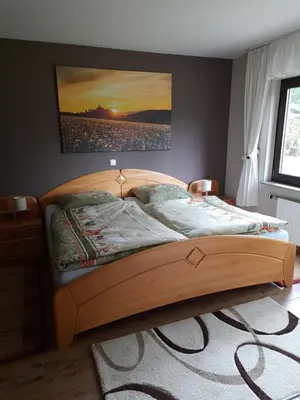 Ein Bett oder Betten in einem Zimmer der Unterkunft Silence Ferienwohnungen mit - 2 Apartments