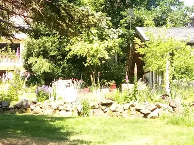 Ein Garten an der Unterkunft Silence Ferienwohnungen mit - 2 Apartments