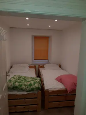 Ein Bett oder Betten in einem Zimmer der Unterkunft Ferienwohnung Castelnau