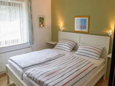 Ein Bett oder Betten in einem Zimmer der Unterkunft Apartment Ferienpark Himmelberg-4 by Interhome