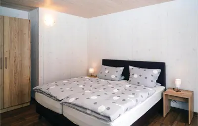 Ein Bett oder Betten in einem Zimmer der Unterkunft Ferienhaus 2 Wolfschlucht