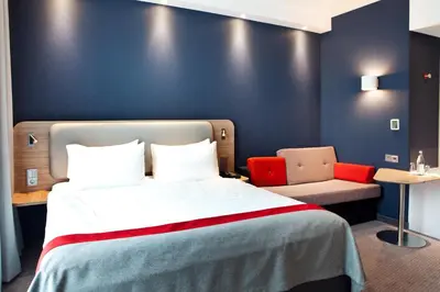 Ein Bett oder Betten in einem Zimmer der Unterkunft Holiday Inn Express - Trier by IHG