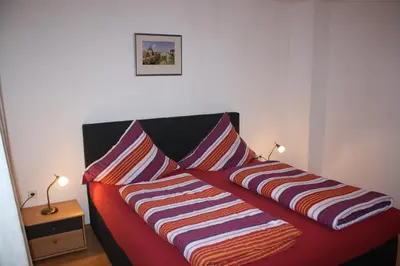 Ein Bett oder Betten in einem Zimmer der Unterkunft Ferienwohnung Ziemons