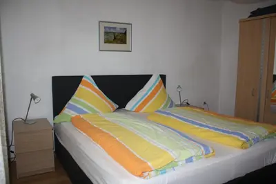 Ein Bett oder Betten in einem Zimmer der Unterkunft Ferienwohnung Ziemons