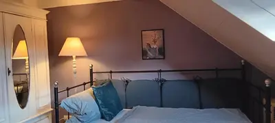 Ein Bett oder Betten in einem Zimmer der Unterkunft Romantische Ferienwohnung Rheingold 50 qm für 2 bis 4 P