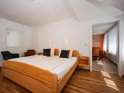 Ein Bett oder Betten in einem Zimmer der Unterkunft Ferienweingut-Liebfried