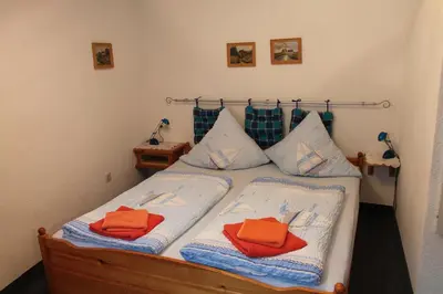 Ein Bett oder Betten in einem Zimmer der Unterkunft Pension Haus Thies