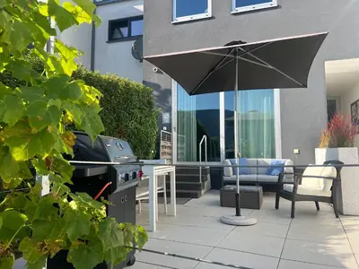 Ein Balkon oder eine Terrasse in der Unterkunft Weingut-Aparthotel Olinger