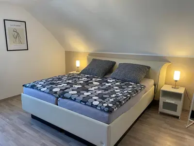 Ein Bett oder Betten in einem Zimmer der Unterkunft Ferienwohnung Jule